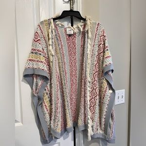 Bohemian multi colored open sweater.Runs big Made by Cabo in great condition.